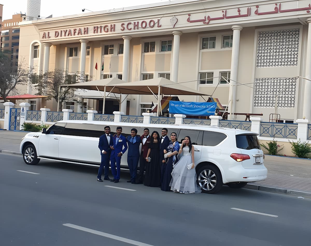 Dubai prom limousine rental – teens arriving in formal dresses and suits
